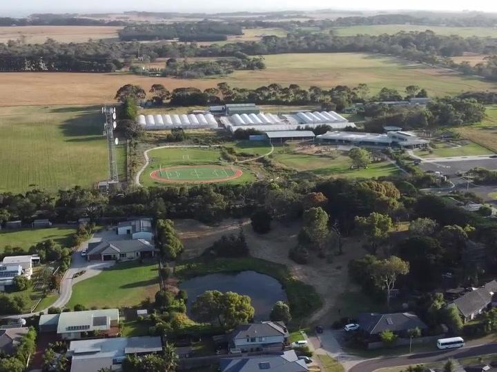 Aerial view over Victorian countryside and homes